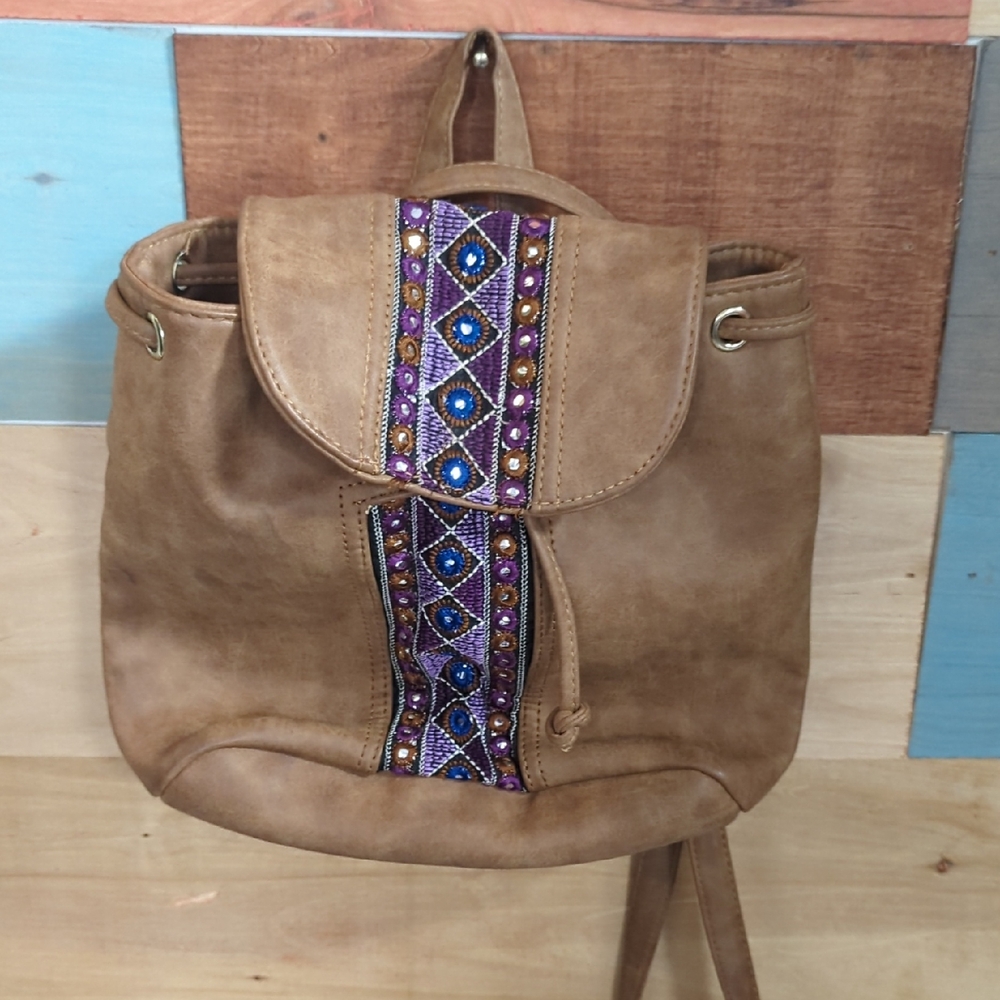 Elegant Tan Backpack with Beaded Design